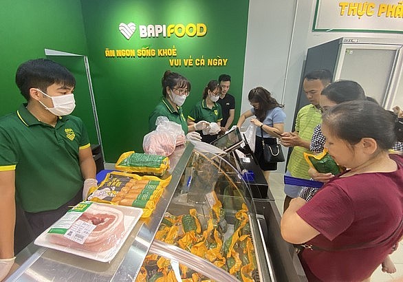 Thịt heo và sản phẩm heo Bapi được người dân chọn mua rất nhiều - Ảnh: C.TUỆ Thịt heo và sản phẩm heo Bapi được người dân chọn mua rất nhiều - Ảnh: C.TUỆ