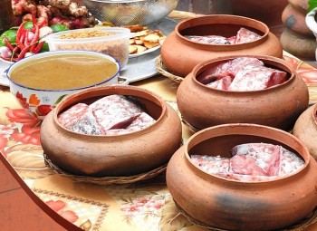 "Vua cá" nước ngọt xưa bán rẻ bèo ở chợ, nay đem kho thành đặc sản nổi tiếng một làng, giá tiền triệu mỗi nồi