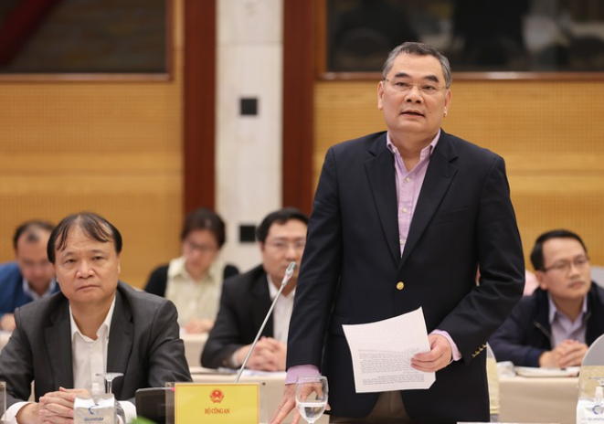 Trung tướng Tô Ân Xô, Người phát ngôn Bộ Công an trả lời báo chí về vấn đề bỏ sổ hộ khẩu - Ảnh: VGP/Nhật Bắc