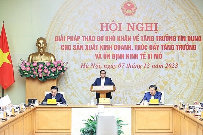 Thủ tướng Phạm Minh Chính chủ trì Hội nghị bàn giải pháp tháo gỡ khó khăn về tăng trưởng tín dụng cho sản xuất, kinh doanh thúc đẩy tăng trưởng và ổn định kinh tế vĩ mô (Ảnh: VGP). Thủ tướng Phạm Minh Chính chủ trì Hội nghị bàn giải pháp tháo gỡ khó khăn về tăng trưởng tín dụng cho sản xuất, kinh doanh thúc đẩy tăng trưởng và ổn định kinh tế vĩ mô (Ảnh: VGP).