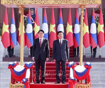 Lễ đón chính thức Chủ tịch nước Lương Cường thăm cấp Nhà nước đến Lào