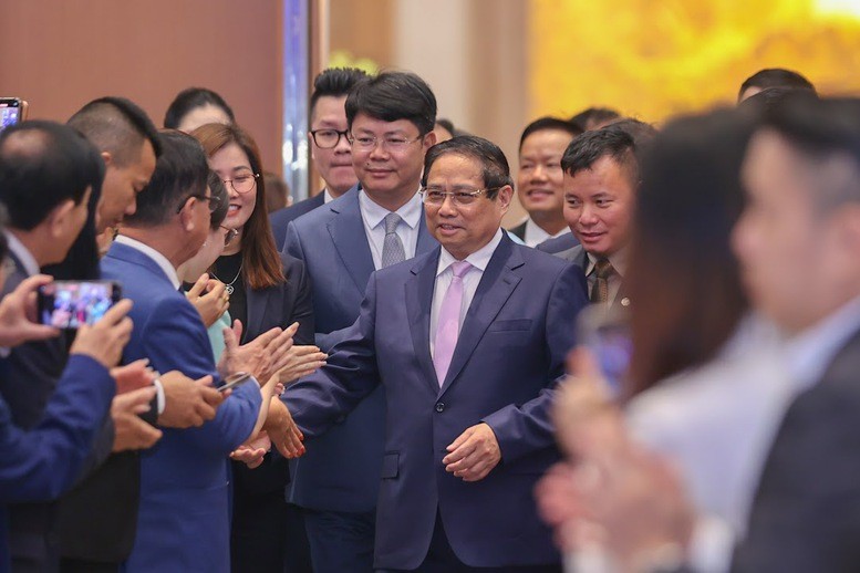 Thủ tướng Chính phủ Phạm Minh Chính đến dự và chủ trì Tọa đàm với doanh nghiệp, hiệp hội doanh nghiệp để thực hiện hiệu quả Nghị quyết 68-NQ/TW của Bộ Chính trị về phát triển kinh tế tư nhân - Ảnh: VGP