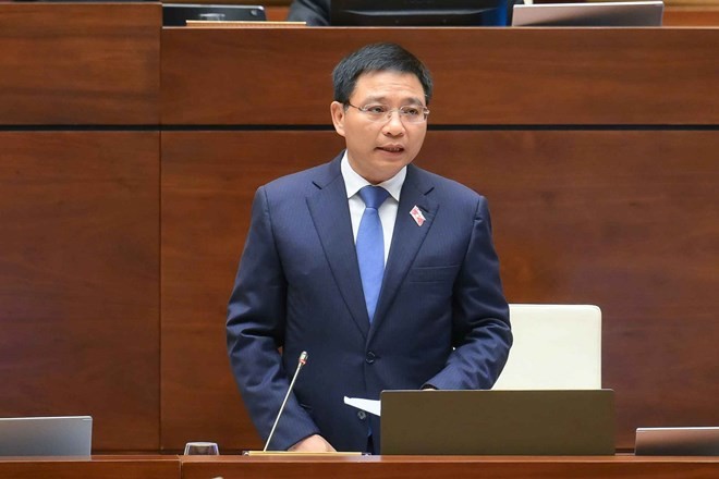 Bộ trưởng Bộ Tài chính Nguyễn Văn Thắng trả lời chất vấn. Ảnh: Tô Thế