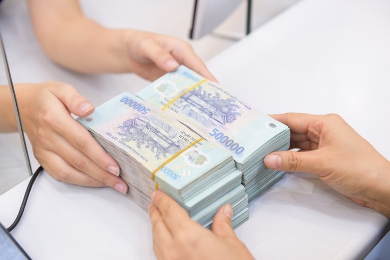 Lãi suất cho vay và huy động giảm không đồng đều