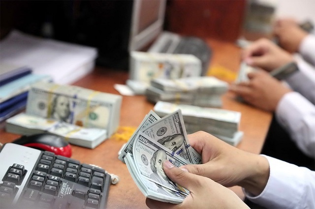 nguy&ecirc;n nh&acirc;n tỷ gi&aacute; USD tăng mạnh